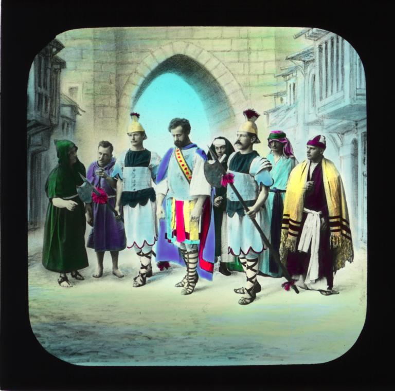 'Two Roman soldiers escorting a man past a small crowd of onlookers' Two Roman soldiers escorting a man past a small crowd of onlookers