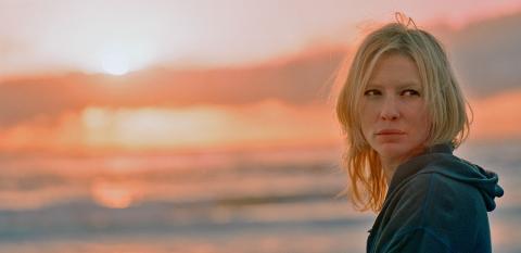 Cate Blanchett in Little Fish Head and shoulders shot of Cate Blanchett with sun rising in the background from the movie Little Fish.